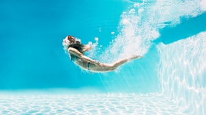 woman diving into vinyl pool