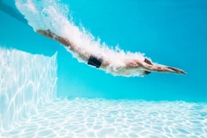 man swimming in Marryland pool